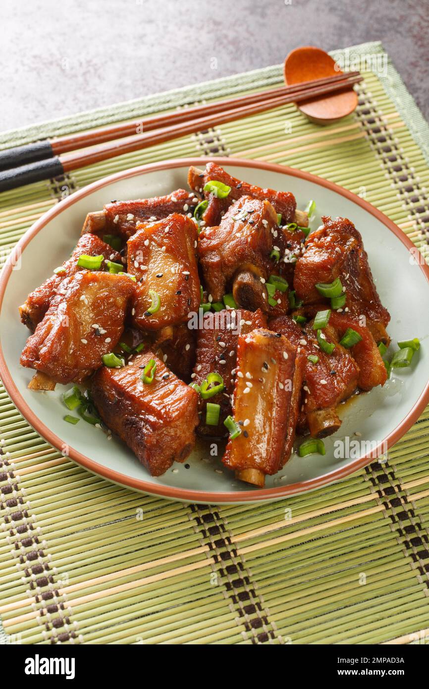 Fried pork short ribs in sweet and sour sauce in Asian style closeup
