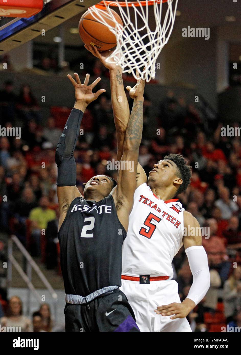 Kansas State s Cartier Diarra 2 and Texas Tech s Justin Gray 5