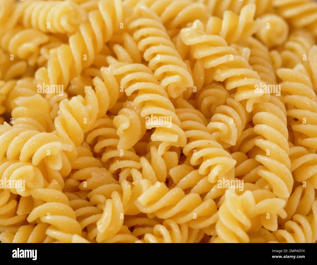 Boiled gluten free fusilli pasta made of corn and rice. Close up. Stock Photo
