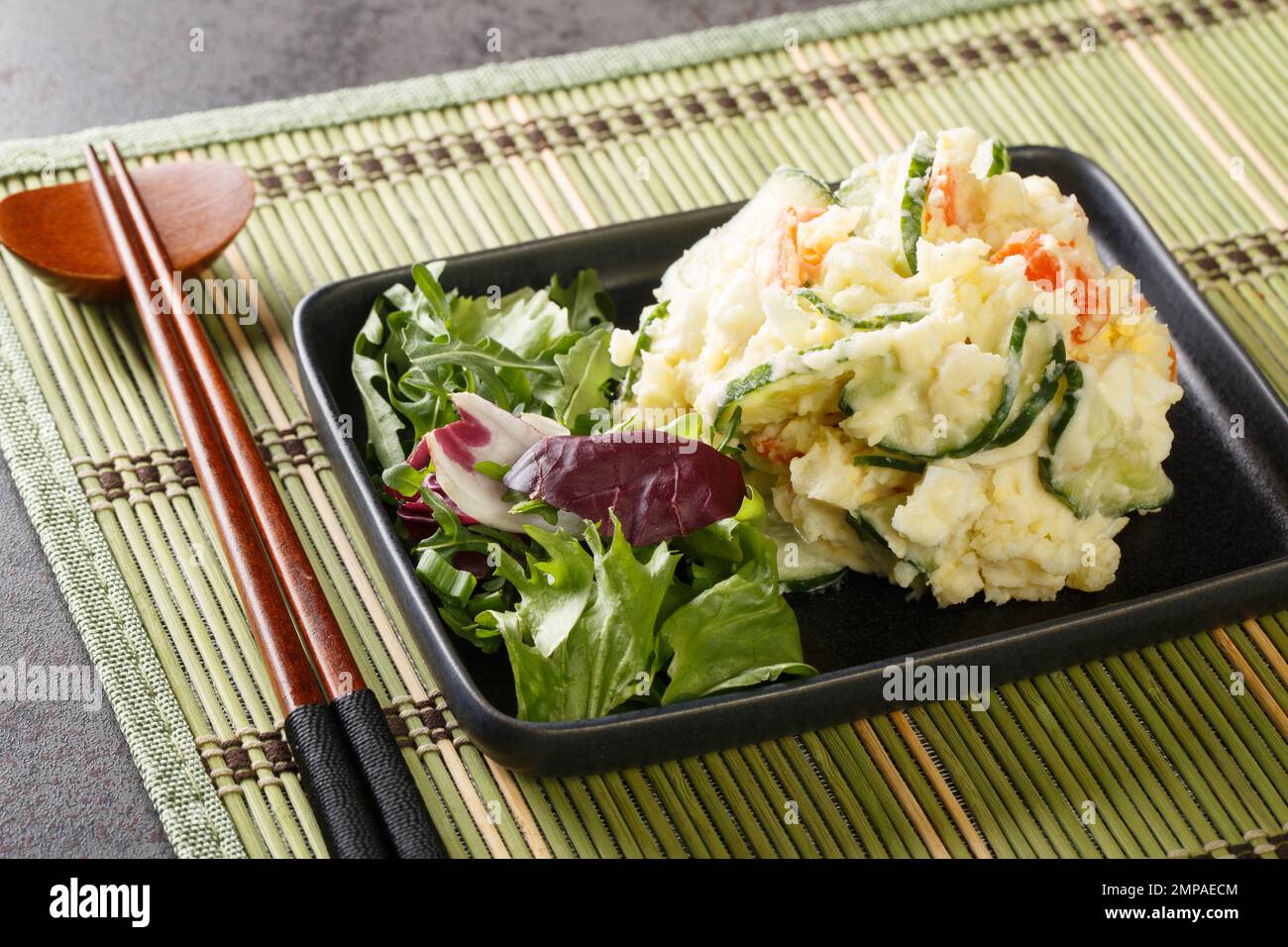 Classic  home-cooked dish Japanese Potato Salad is distinct because of its colorful addition of fresh vegetables, creamy texture and rounded flavor cl Stock Photo