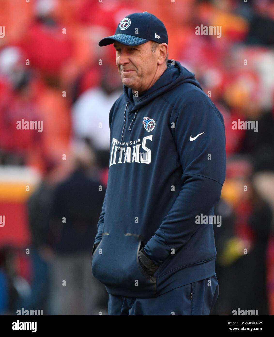 Tennessee Titans head coach Mike Mularkey follows warmups before an NFL