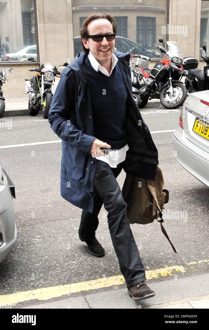 UK standup comedians Alexander Armstrong and Ben Miller pose for photos outside BBC Radio 2