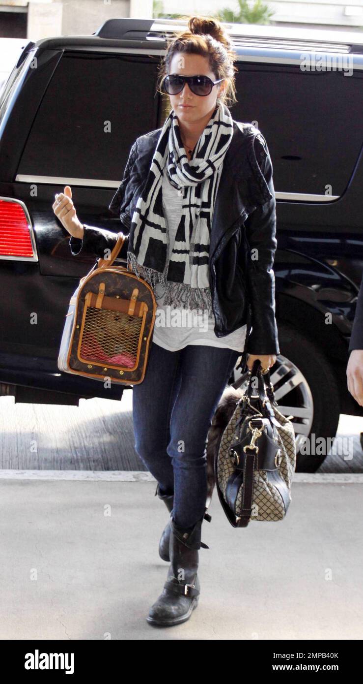 ashley tisdale wears a louis vuitton fanny pack, grey t-shirt and