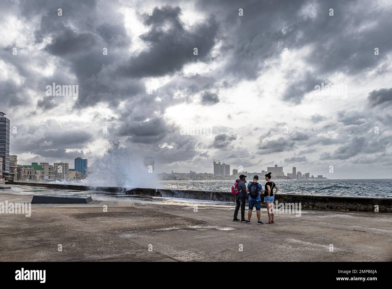 cuba havana wave breaking against retaining wall along the malecon ...