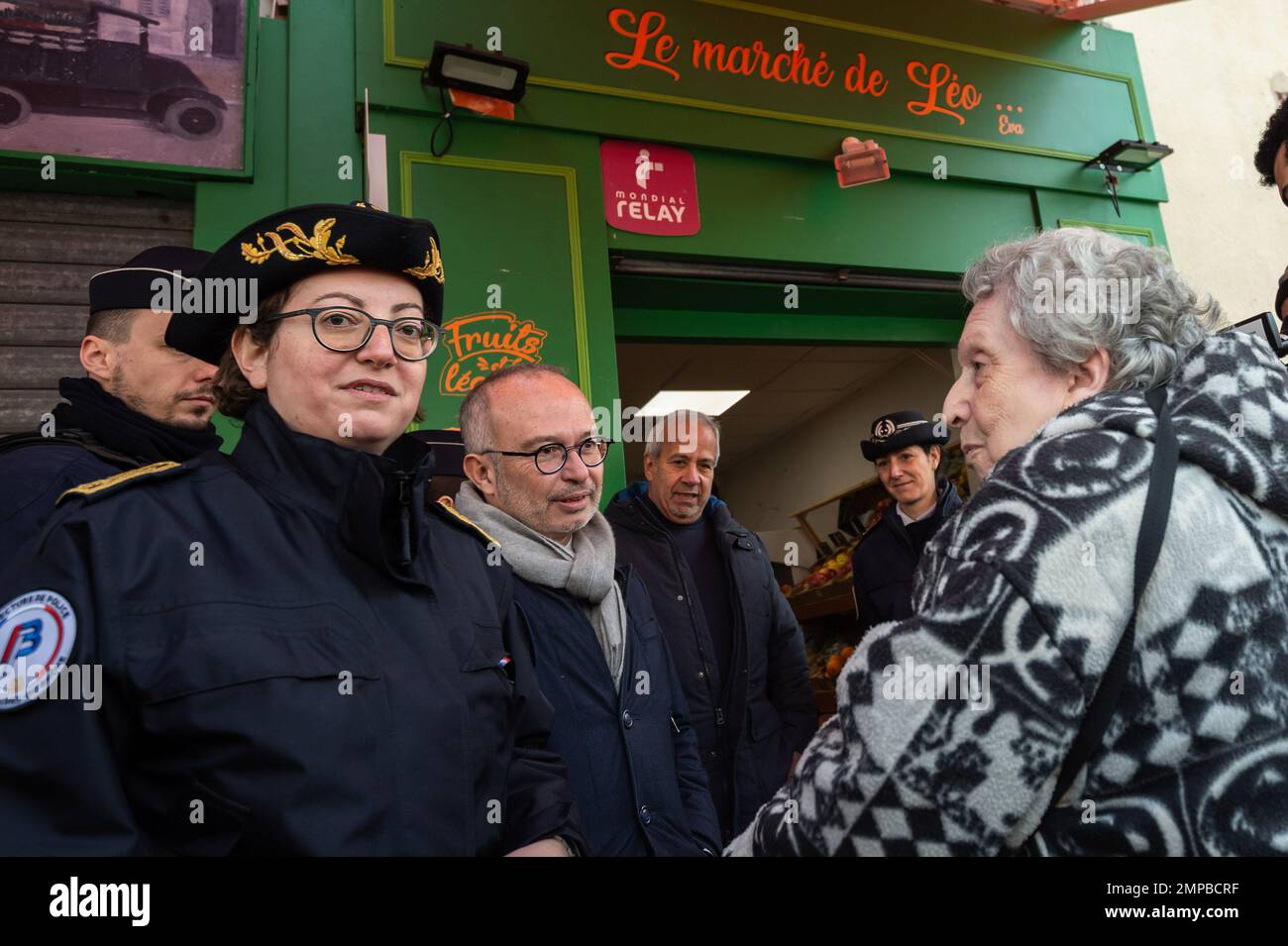 January 27, 2023, Marseille, France: Frederique Camilleri (L) and Lionel Royer-Perreaut (L2) talk to an elderly woman (R) who complains about the feeling of insecurity in the 9th district of Marseille French MP Lionel Royer-Perreaut and police prefect Frederique Camilleri visited the 9th district police station in Marseille to see its state of disrepair following the announcement by the Minister of the Interior that it would not be closed as had been envisaged. They took part in a patrol in the streets of the district and questioned the inhabitants about the effectiveness of the police presenc Stock Photo