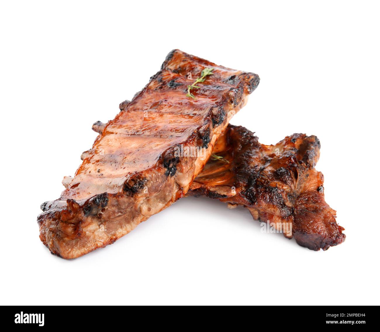 Tasty grilled ribs with thyme isolated on white Stock Photo - Alamy