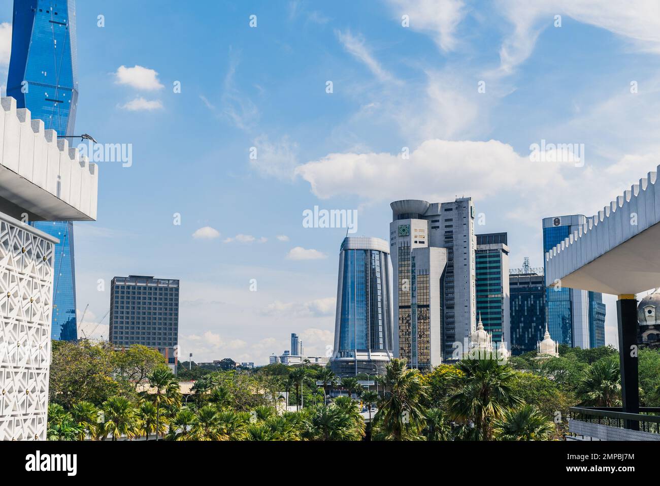 An image of a city with high skyscrapers under the blue sky Stock Photo ...