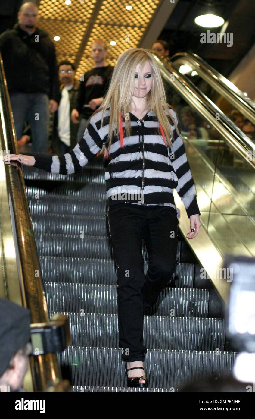 Multiplatinum singer songwriter Avril Lavigne performs a song at the