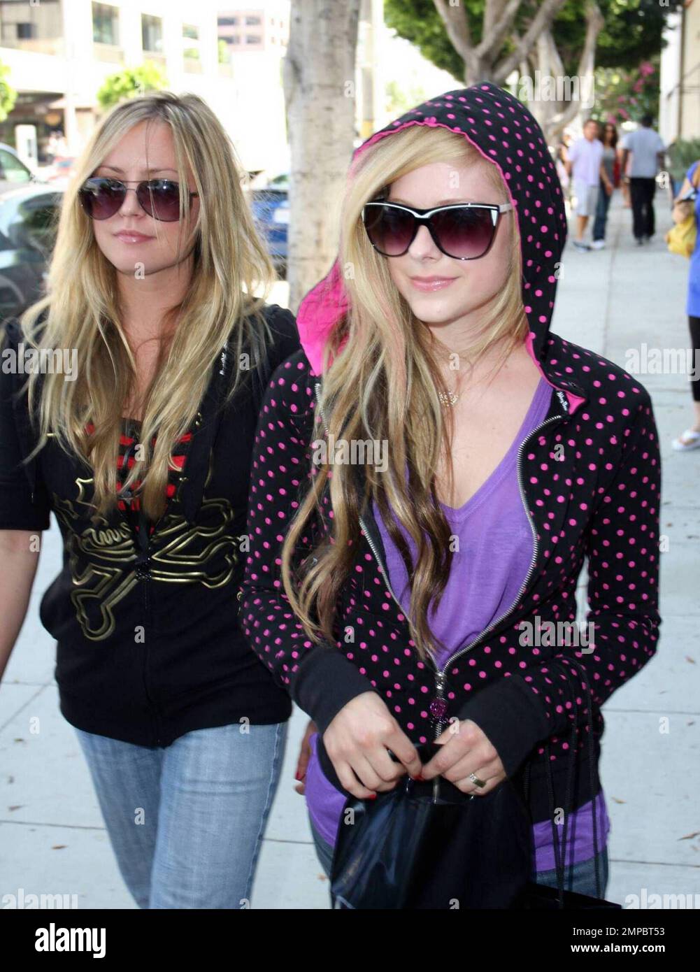 Avril Lavigne and a female friend shop at Chanel in Beverly Hills