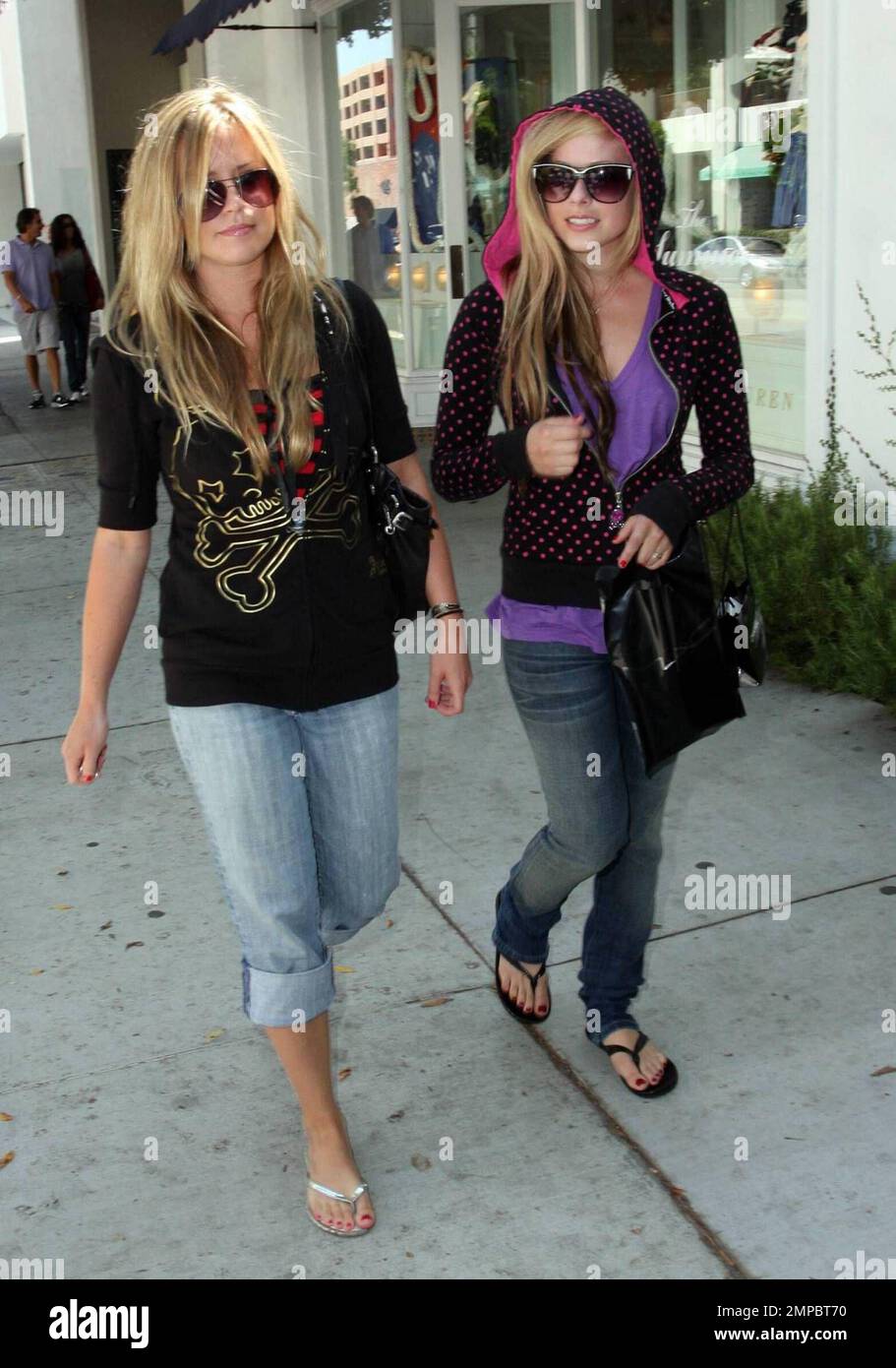 Avril Lavigne and a female friend shop at Chanel in Beverly Hills