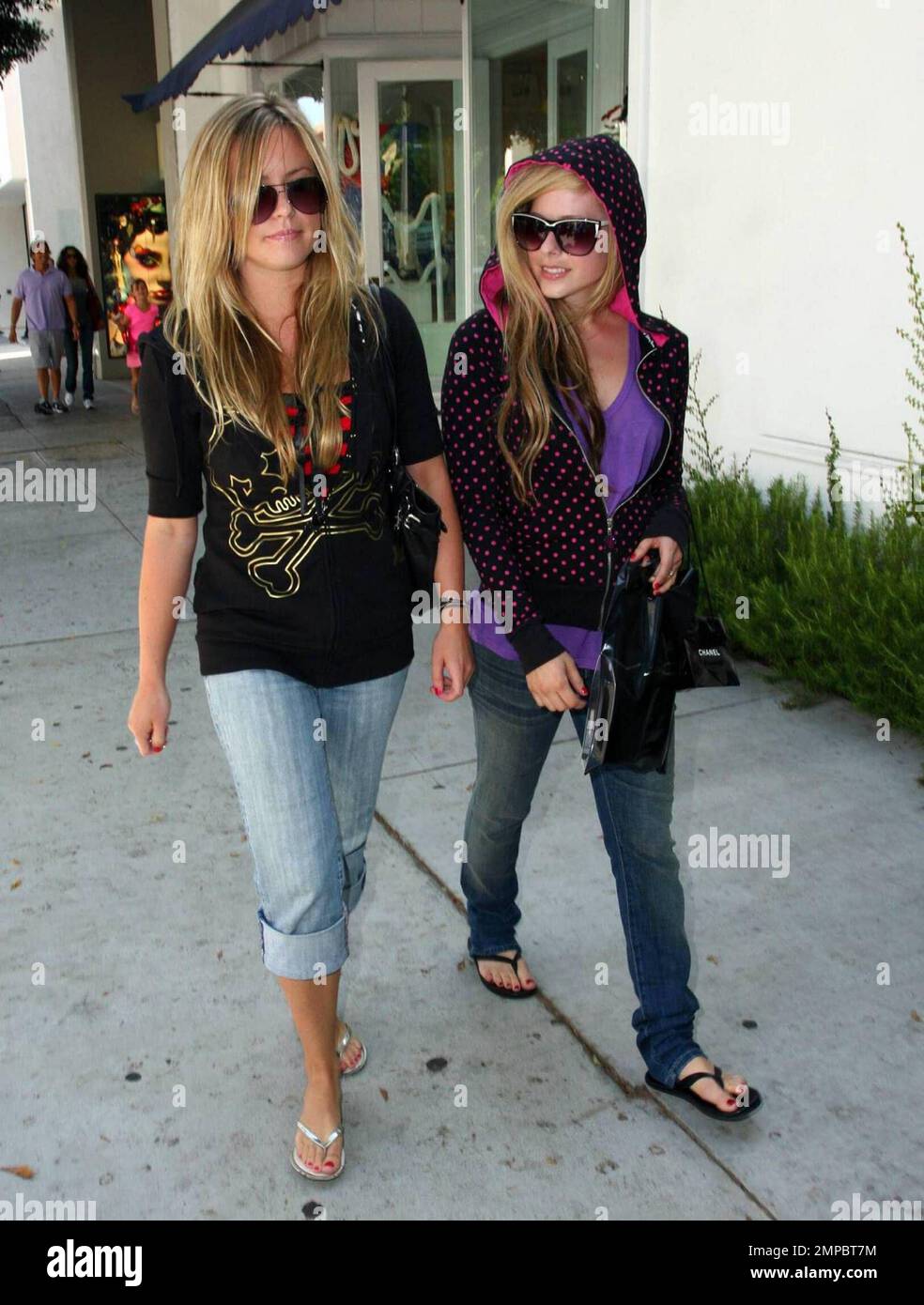 Avril Lavigne and a female friend shop at Chanel in Beverly Hills
