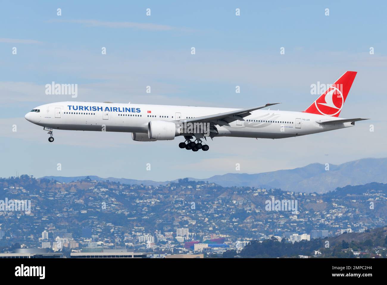 Turkish Airlines Boeing 777 plane. Airplane Boeing 777-300ER of Turkish Airlines before landing. Aircraft TC-JJV. Stock Photo
