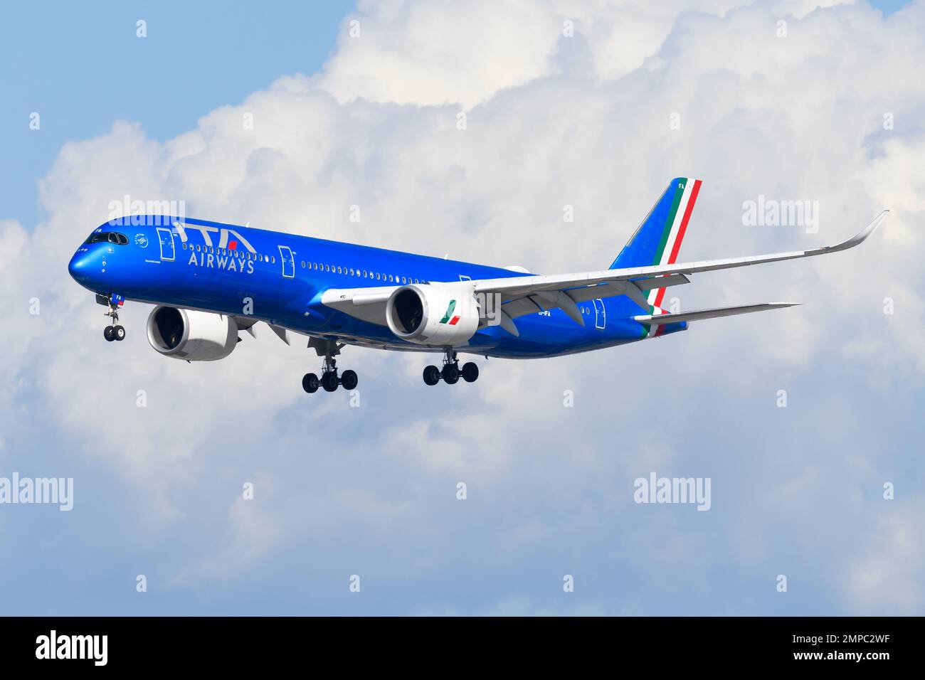 ITA Airways Airbus A350 aircraft landing. New national airline of Italy. Blue livery on airplane A350-900 of ITA Airways, Italia Transporto Aereo. Stock Photo
