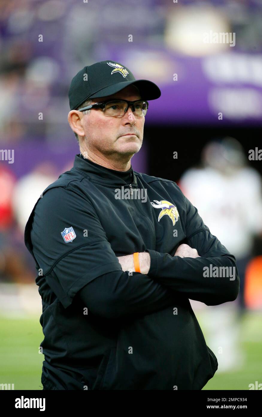 Minnesota Vikings head coach Mike Zimmer walks on the field before an
