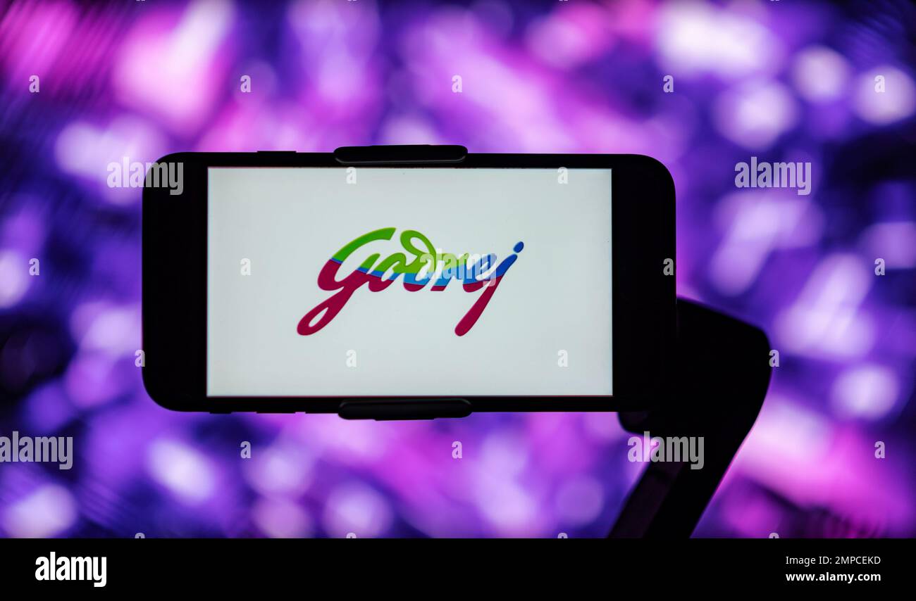 In this photo illustration the logo of Godrej seen displayed on a
