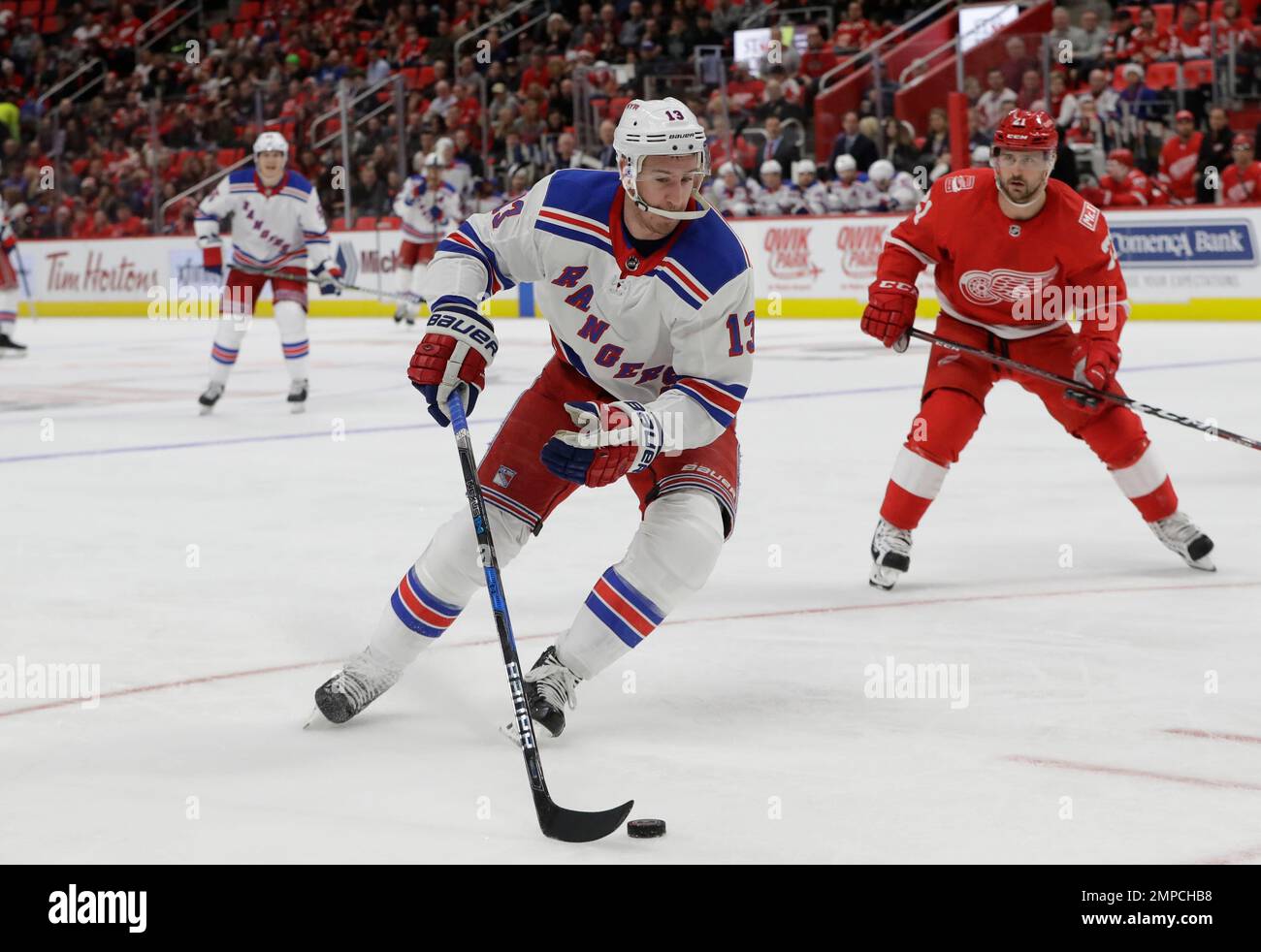 New York Rangers center Kevin Hayes (13) controls the puck during the