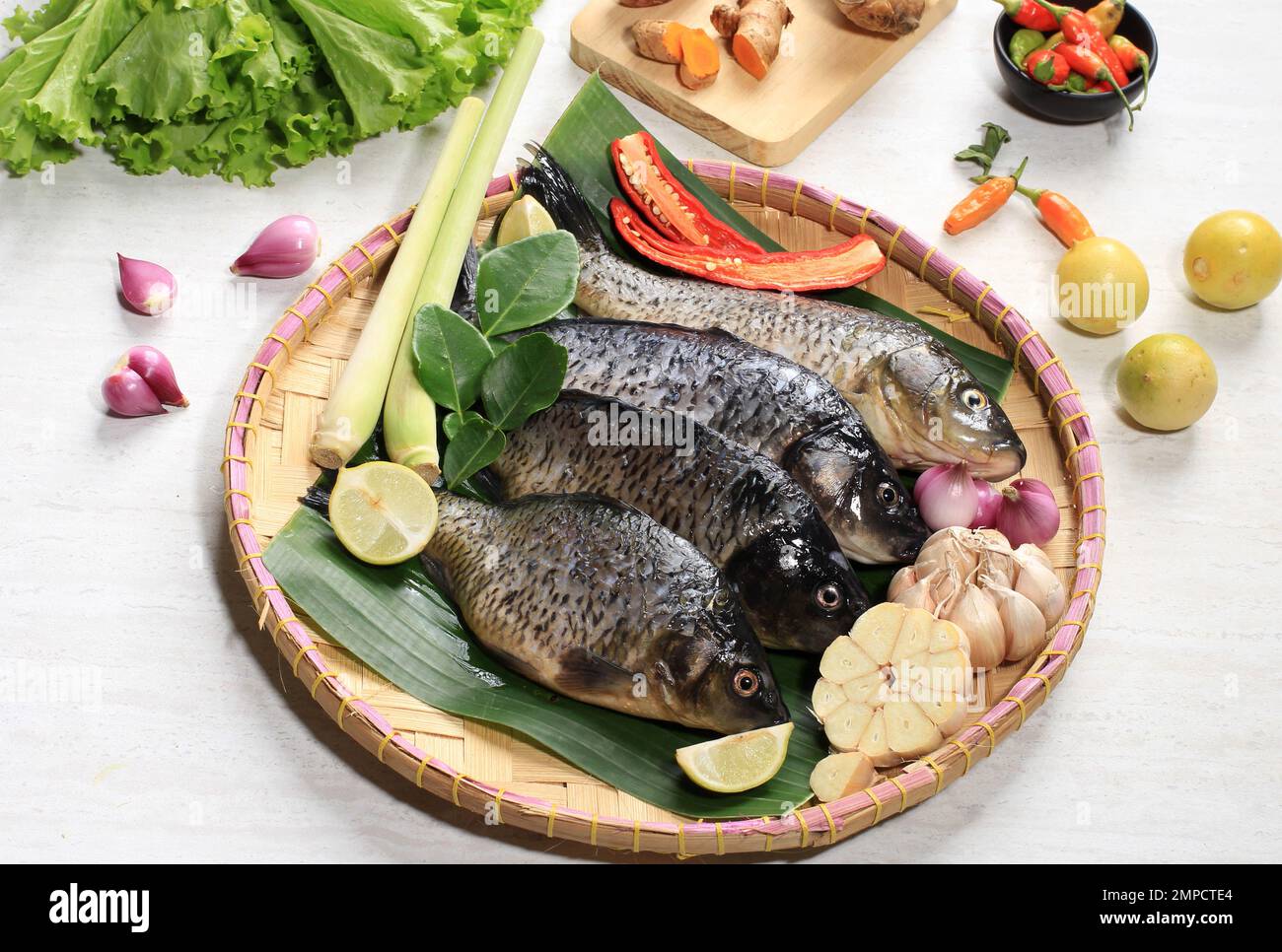 Raw Gold Fish Cyprinus carpio with Spice before Cook. Making Asian Menu