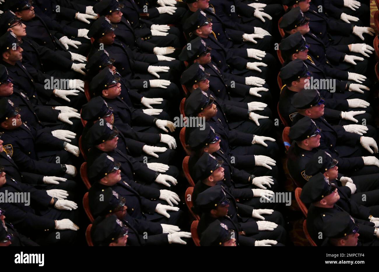 New police officers attend their graduation ceremony at the Beacon ...
