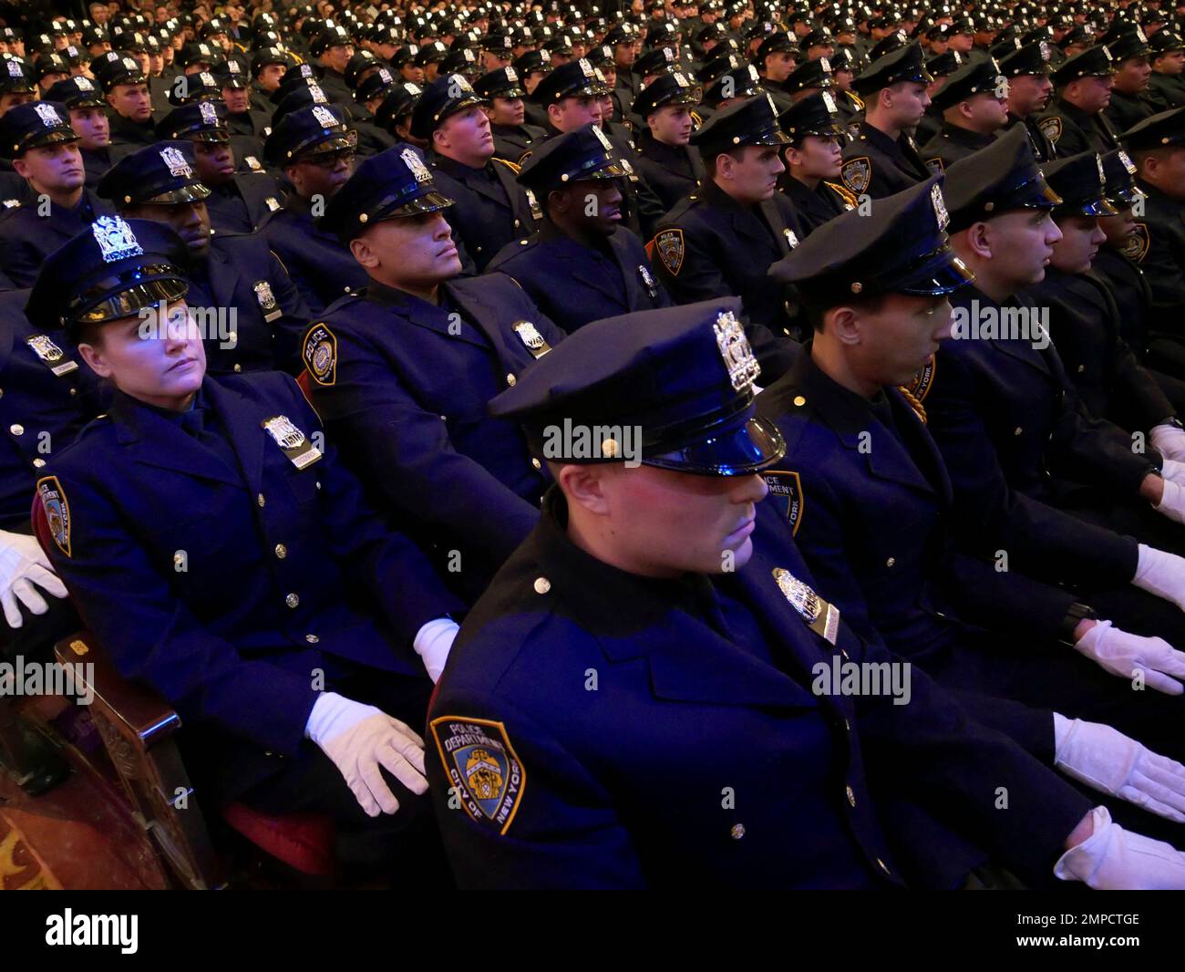 New police officers attend their graduation ceremony at the Beacon ...