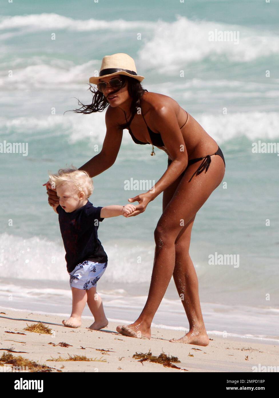 Boris Becker spends beach time with son Amadeus and Nanny, Miami Beach, FL,  03/09/11 Stock Photo - Alamy