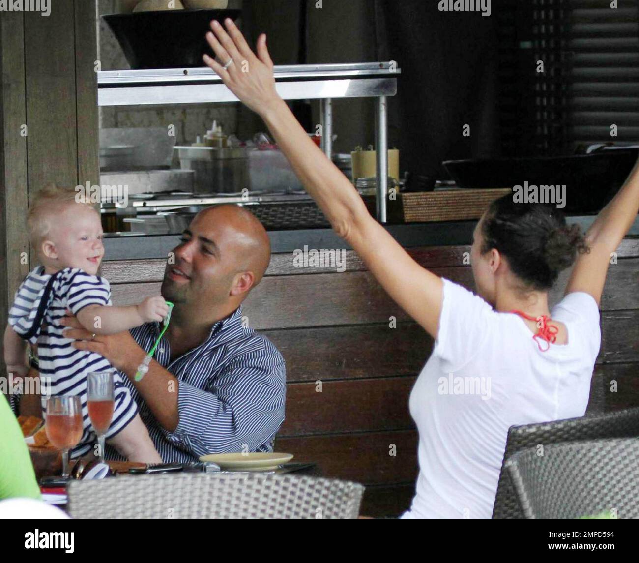 Former number one professional tennis player Boris Becker and his wife  Sharlely 'Lilly' Kerssenberg Becker enjoy a relaxing lunch at their luxury  hotel with friends and their baby son Amadeus Benedict Edley