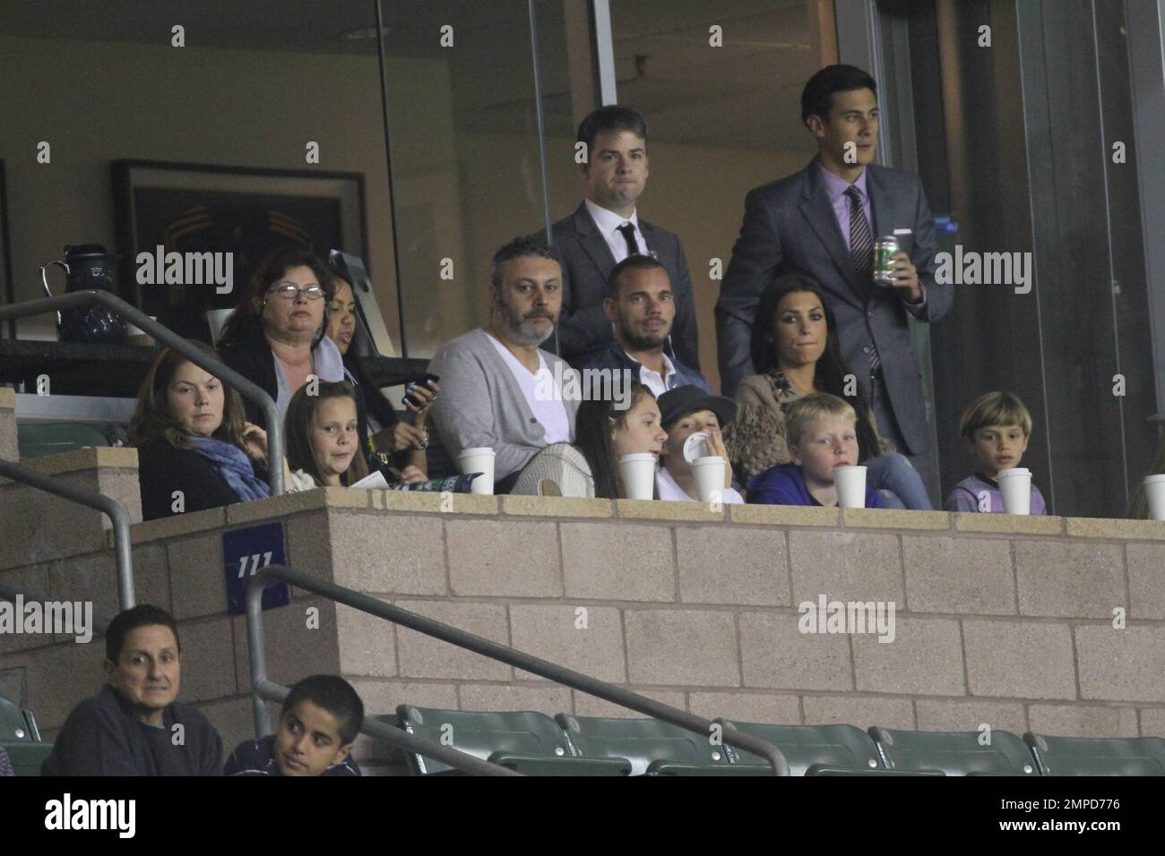 Brooklyn, Romeo and Cruz Beckham watch dad David as he leads the LA Galaxy to a 0-0 tie over the D.C. United. During the game D.C. United midfielder Fred sent Beckham flying with a hard tackle that drew a yellow card in the first half at Home Depot Center. Also  in the box with the boys was Wayne Sneijder and his wife, Dutch actress, Yolanthe Cabau van Kasbergen.  Beckham's pregnant wife Victoria did not appear to be at the game today.  Los Angeles, CA. 06/03/2011. Stock Photo