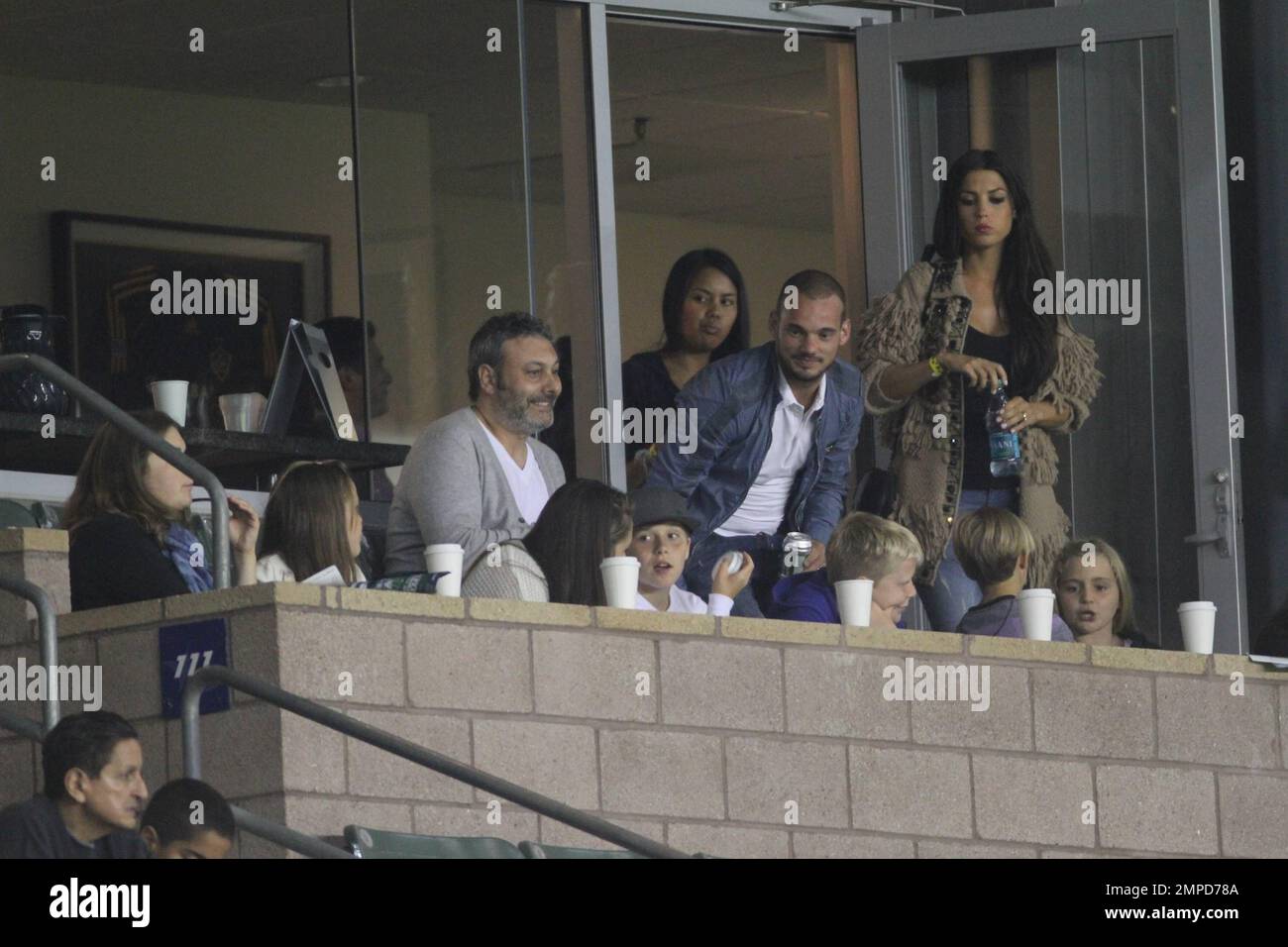 Brooklyn, Romeo and Cruz Beckham watch dad David as he leads the LA Galaxy to a 0-0 tie over the D.C. United. During the game D.C. United midfielder Fred sent Beckham flying with a hard tackle that drew a yellow card in the first half at Home Depot Center. Also  in the box with the boys was Wayne Sneijder and his wife, Dutch actress, Yolanthe Cabau van Kasbergen.  Beckham's pregnant wife Victoria did not appear to be at the game today.  Los Angeles, CA. 06/03/2011. Stock Photo