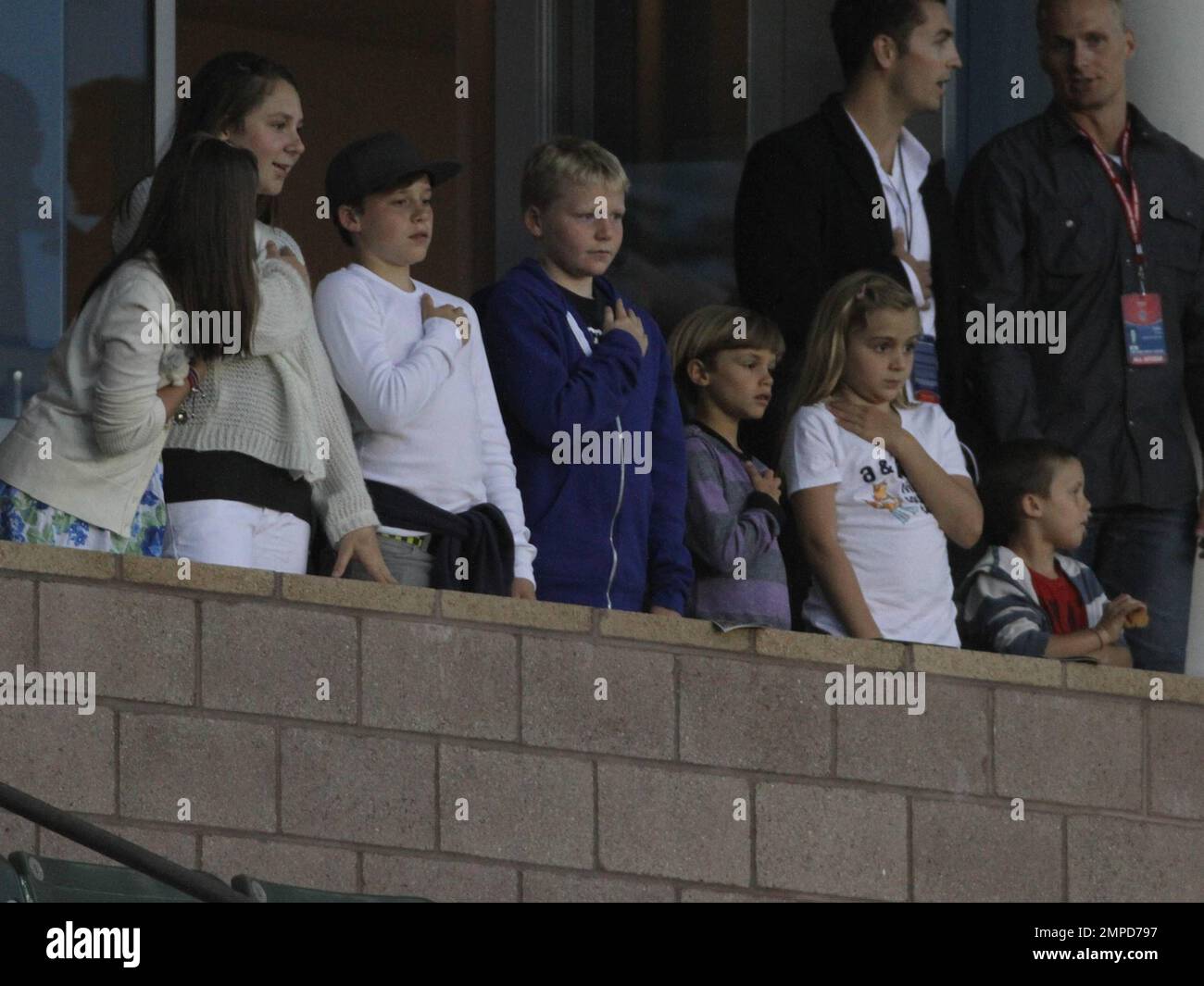 Brooklyn, Romeo and Cruz Beckham watch dad David as he leads the LA Galaxy to a 0-0 tie over the D.C. United. During the game D.C. United midfielder Fred sent Beckham flying with a hard tackle that drew a yellow card in the first half at Home Depot Center. Also  in the box with the boys was Wayne Sneijder and his wife, Dutch actress, Yolanthe Cabau van Kasbergen.  Beckham's pregnant wife Victoria did not appear to be at the game today.  Los Angeles, CA. 06/03/2011. Stock Photo