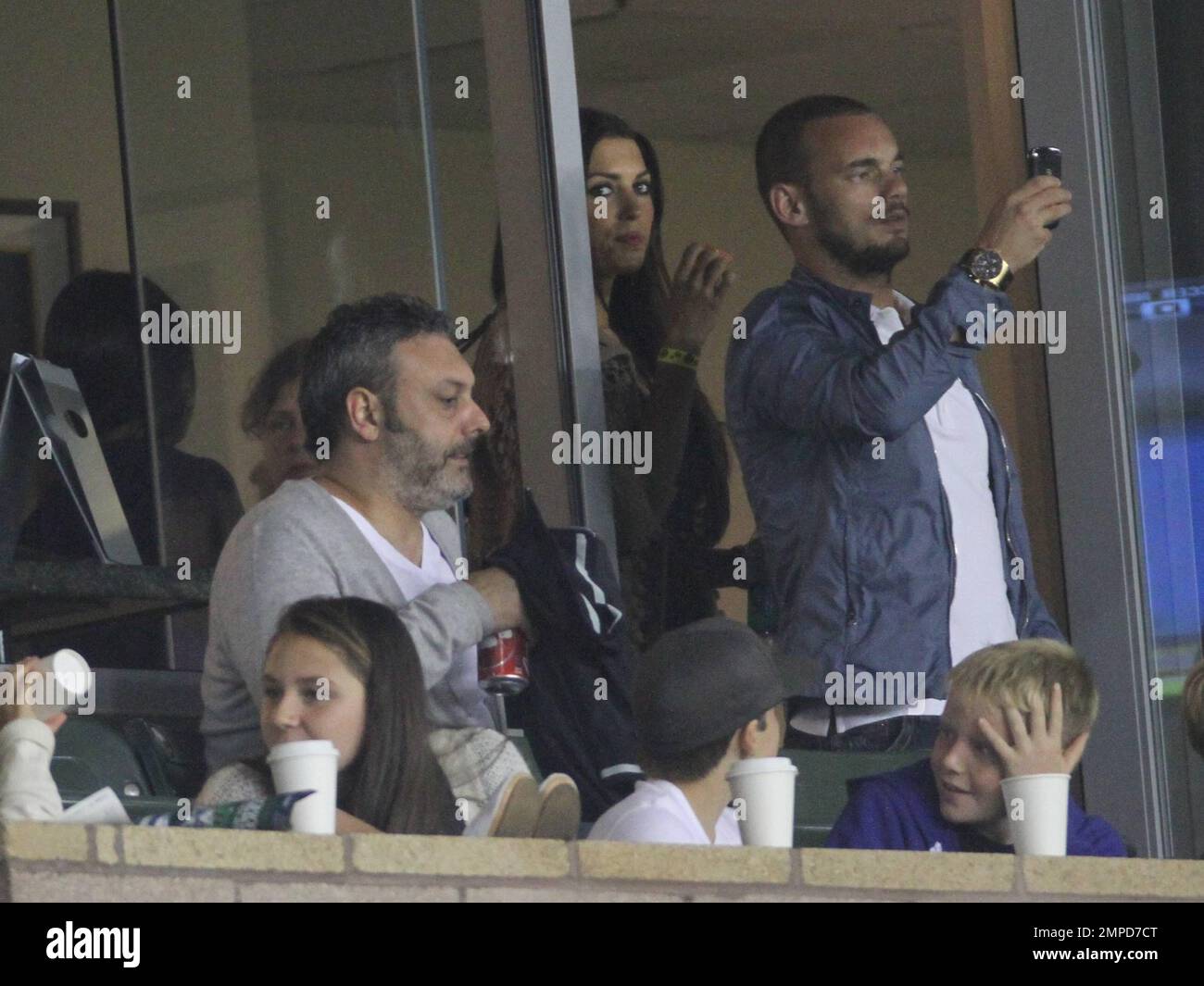 Brooklyn, Romeo and Cruz Beckham watch dad David as he leads the LA Galaxy to a 0-0 tie over the D.C. United. During the game D.C. United midfielder Fred sent Beckham flying with a hard tackle that drew a yellow card in the first half at Home Depot Center. Also  in the box with the boys was Wayne Sneijder and his wife, Dutch actress, Yolanthe Cabau van Kasbergen.  Beckham's pregnant wife Victoria did not appear to be at the game today.  Los Angeles, CA. 06/03/2011. Stock Photo