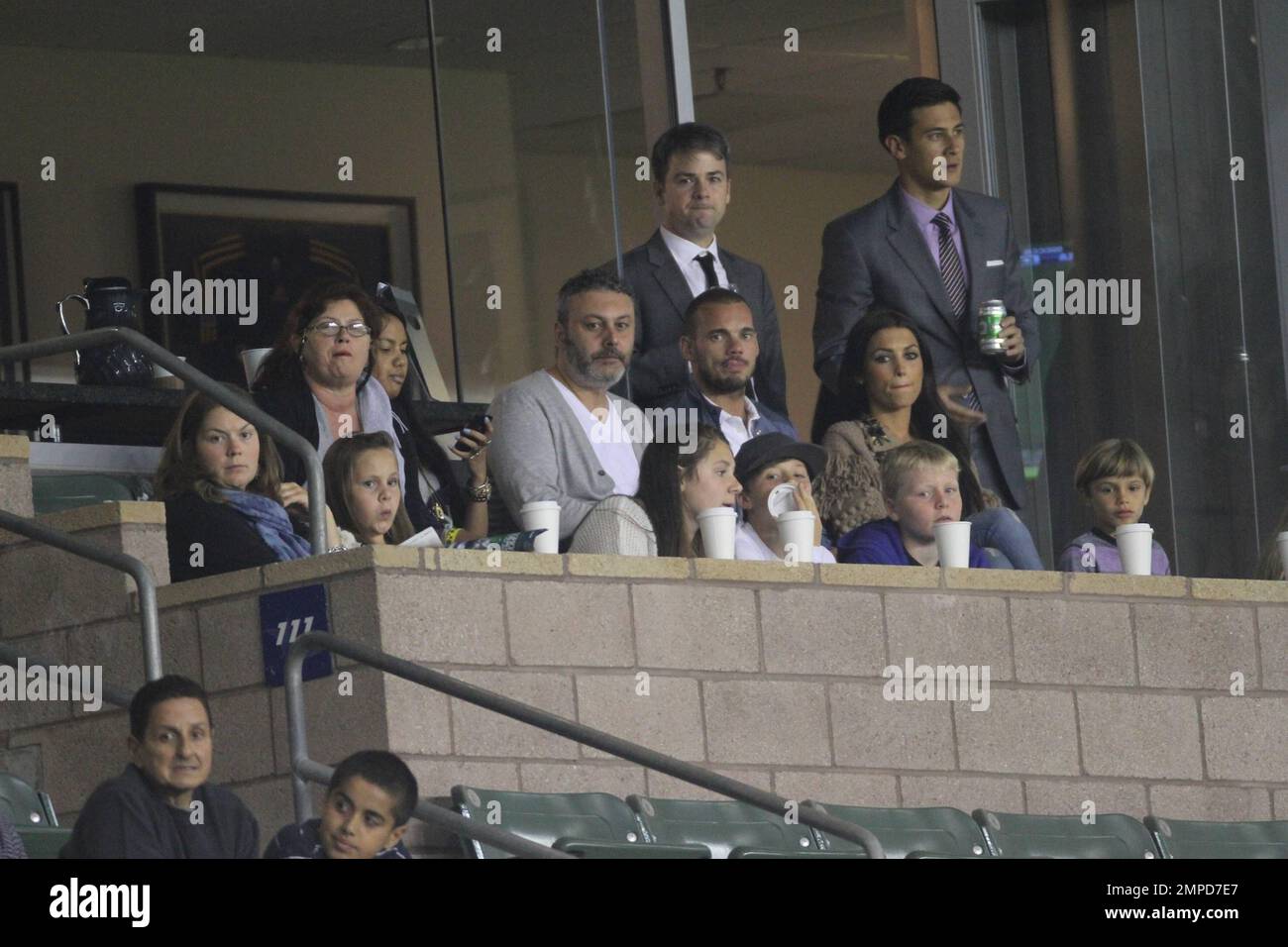 Brooklyn, Romeo and Cruz Beckham watch dad David as he leads the LA Galaxy to a 0-0 tie over the D.C. United. During the game D.C. United midfielder Fred sent Beckham flying with a hard tackle that drew a yellow card in the first half at Home Depot Center. Also  in the box with the boys was Wayne Sneijder and his wife, Dutch actress, Yolanthe Cabau van Kasbergen.  Beckham's pregnant wife Victoria did not appear to be at the game today.  Los Angeles, CA. 06/03/2011. Stock Photo