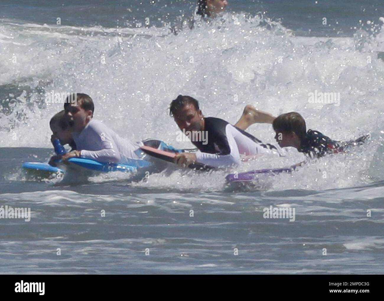 David Beckham and his three sons enjoy another day boogie boarding(02)