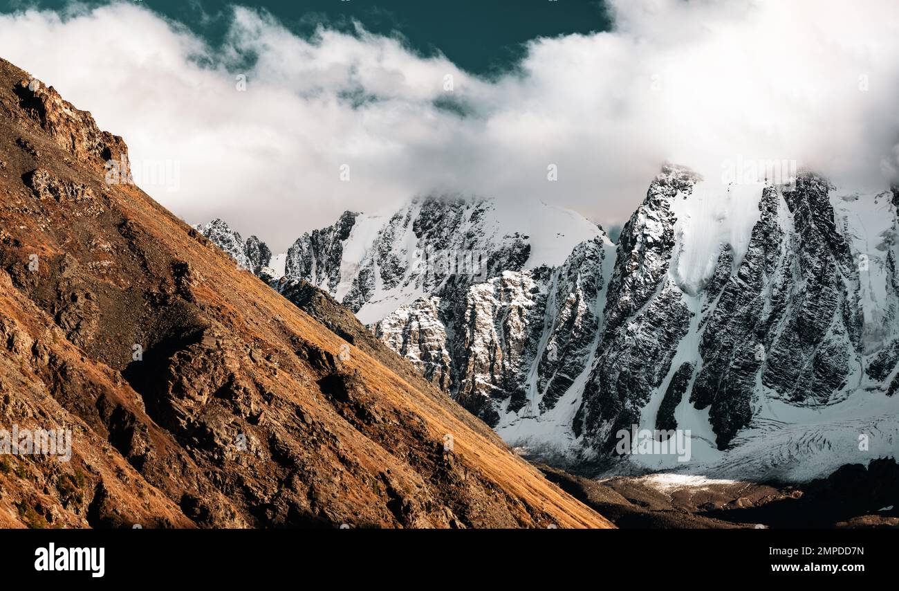 Panorama of the tongue of an alpine glacier with snow descends from ...