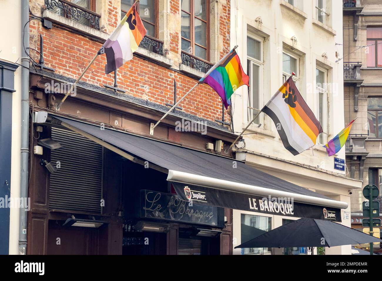 Different LGBT flags hanging on a building in Brussels, Stock Photo