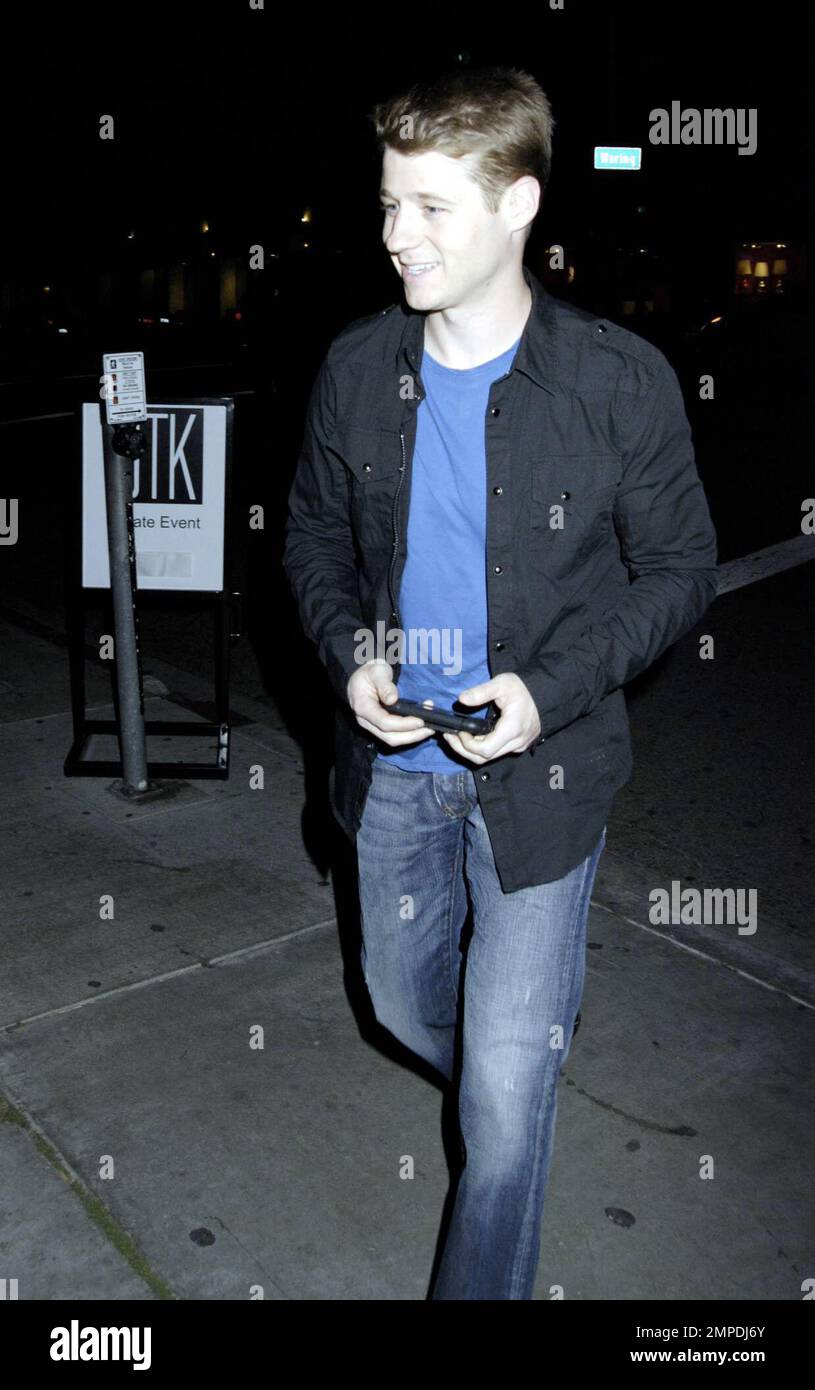 Actor Benjamin McKenzie outside STK restaurant. Ben tried very hard not to be photographed with the girl he was with as they arrived and left together in West Hollywood, CA. 3/25/08.  . Stock Photo