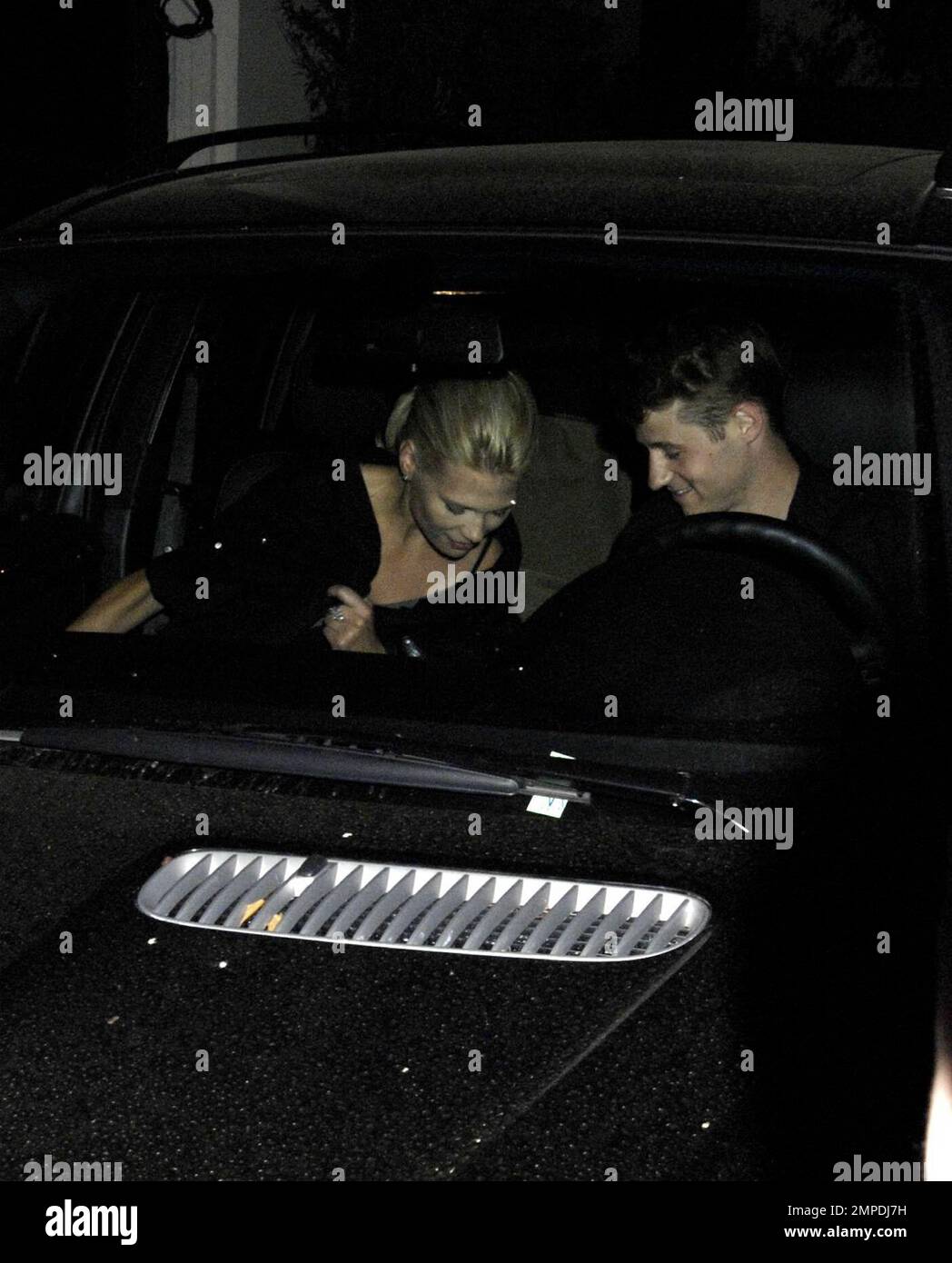 Actor Benjamin McKenzie outside STK restaurant. Ben tried very hard not to be photographed with the girl he was with as they arrived and left together in West Hollywood, CA. 3/25/08.  . Stock Photo