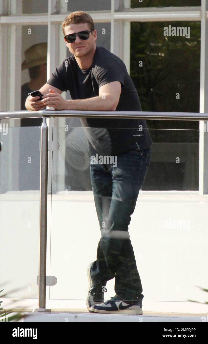OC Actor Benjamin McKenzie checked his phone while enjoying the Miami ...