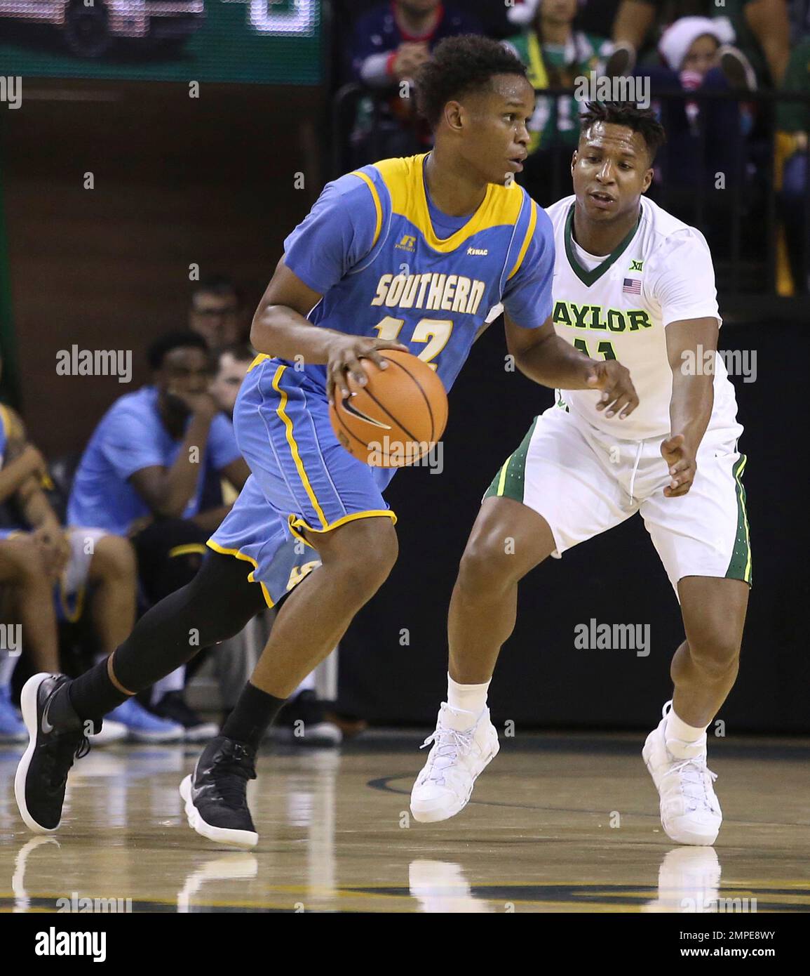 Southern University forward Jared Sam (12) drives against Baylor ...