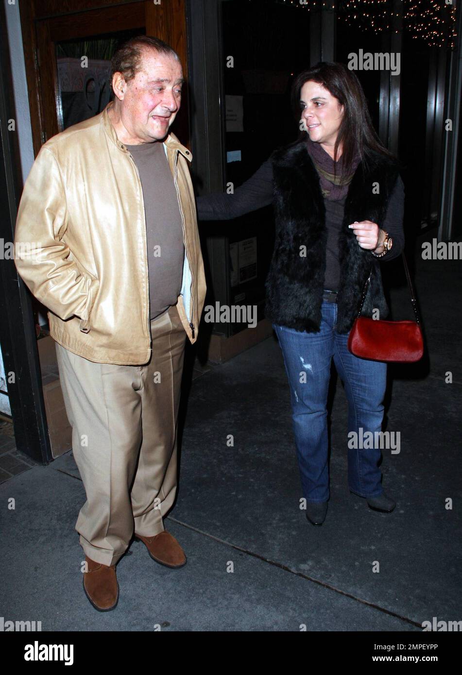 EXCLUSIVE!! Boxing promoter Bob Arum poses for photos outside the