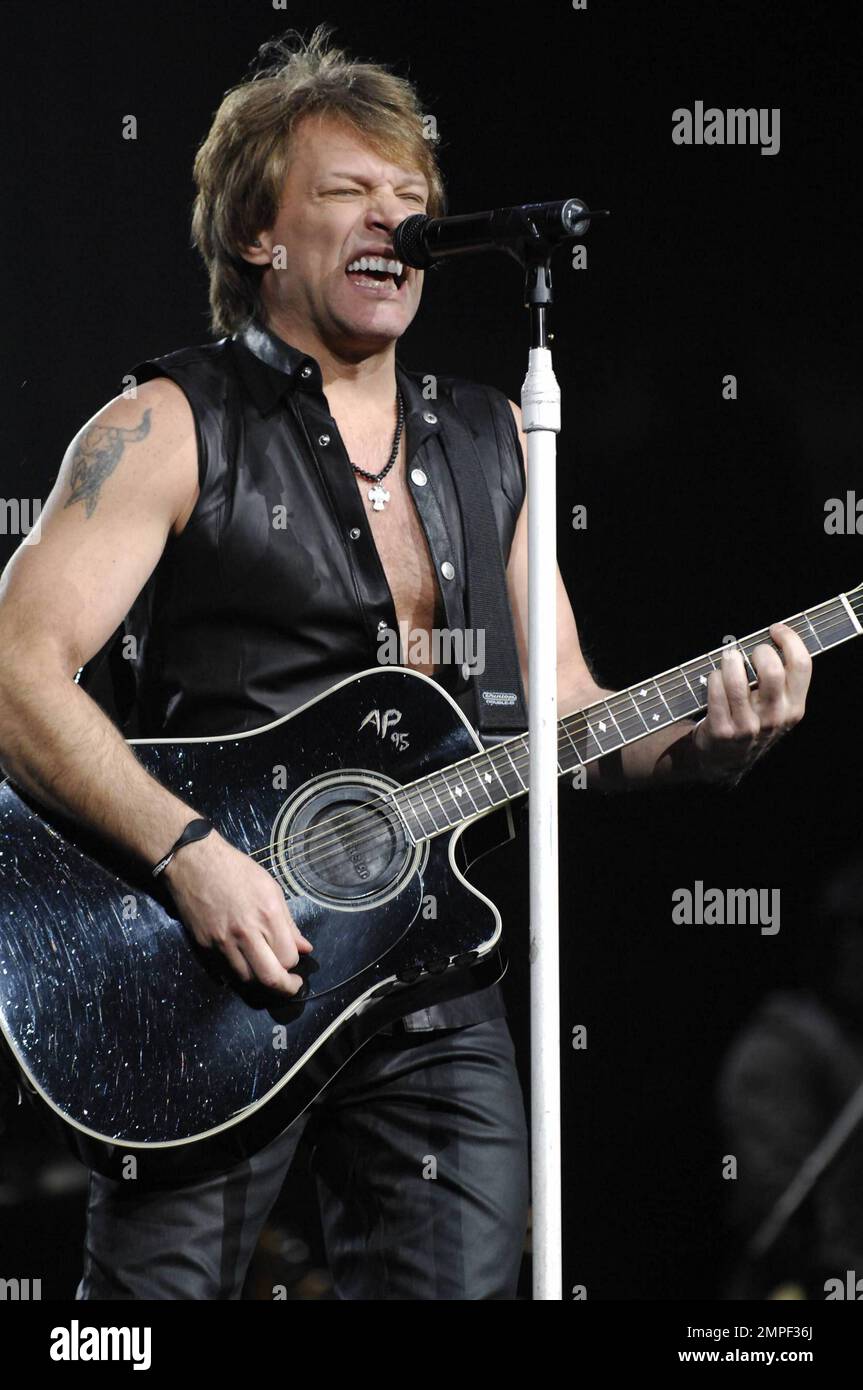 Wearing leather pants and a black vest Jon Bon Jovi, who recently  celebrated his 49th birthday, performs the first of two shows with Bon Jovi  at the United Center. Chicago, IL. 03/08/11, image size:863x1390