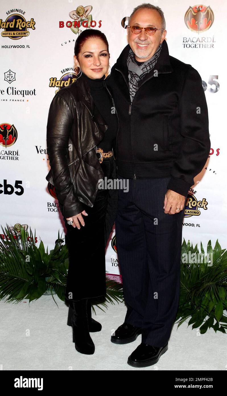 Gloria and Emilio Estefan attend the grand opening of Bongos Cuban Cafe