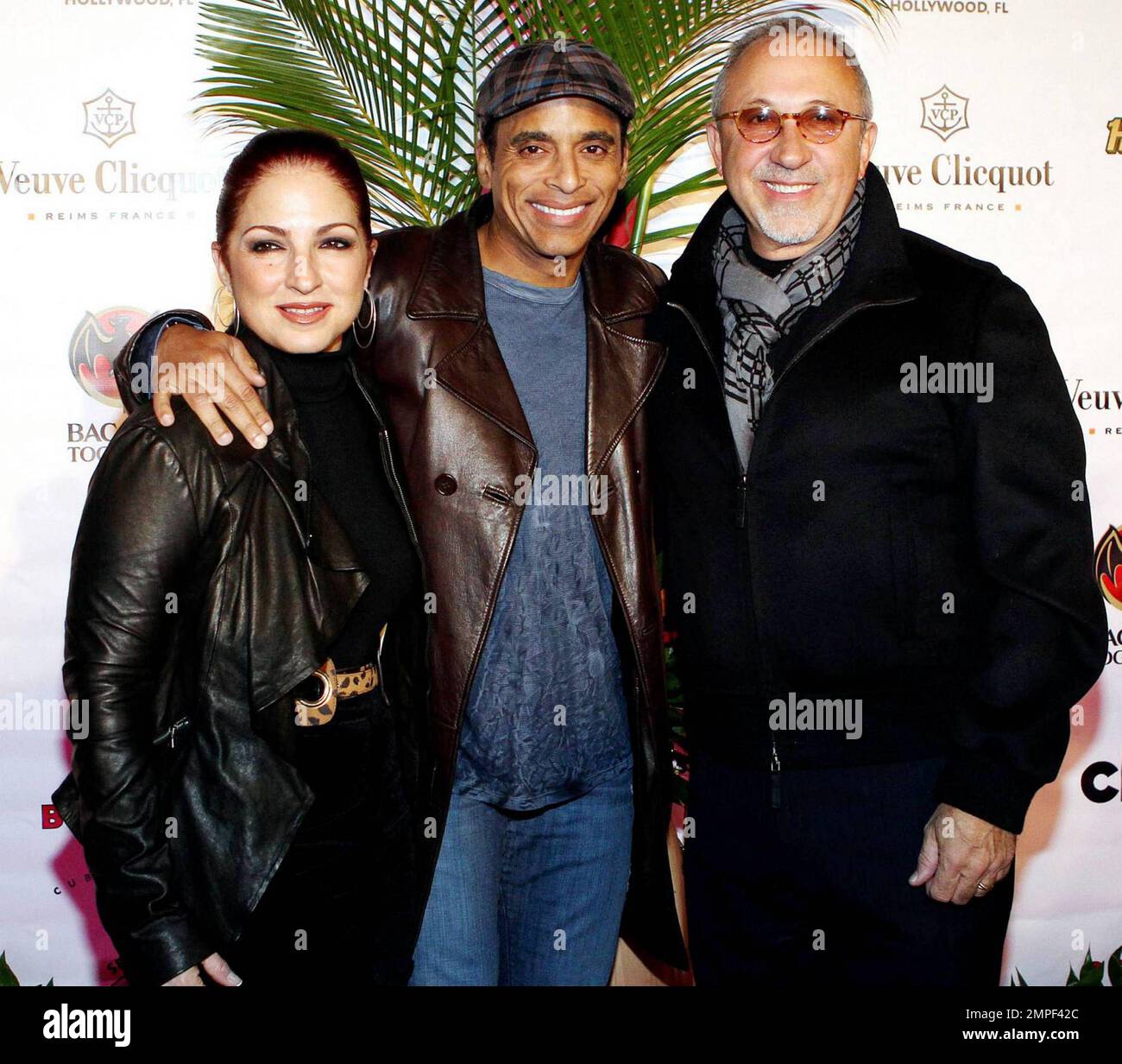Gloria Estefan, Jon Secada (C) and Emilio Estefan attend the grand