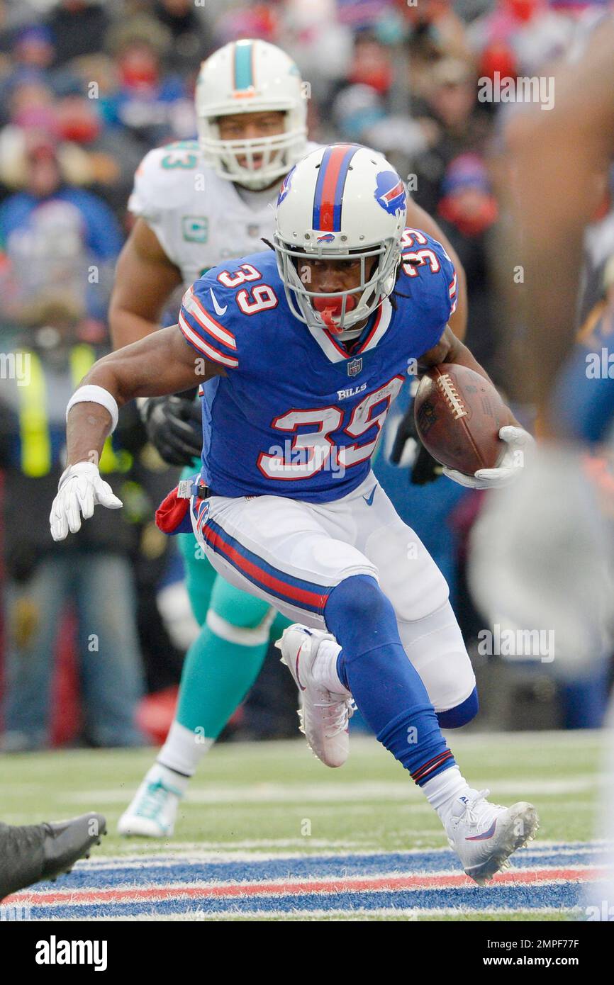 Buffalo Bills running back Travaris Cadet (39) carries the ball during the  first half of an NFL football game against the Miami Dolphins, Sunday, Dec.  17, 2017, in Orchard Park, N.Y. Buffalo