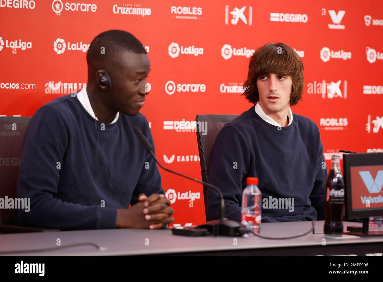 Seville, Spain. 31st Jan, 2023. Footballers Bryan Gil (R) and Pape Gueye (L) are presented as new Sevilla FC players during a press coference at the Estadio Ramon Sanchez Pizjuan in Seville. (Photo Credit: Gonzales Photo/Alamy Live News Stock Photo