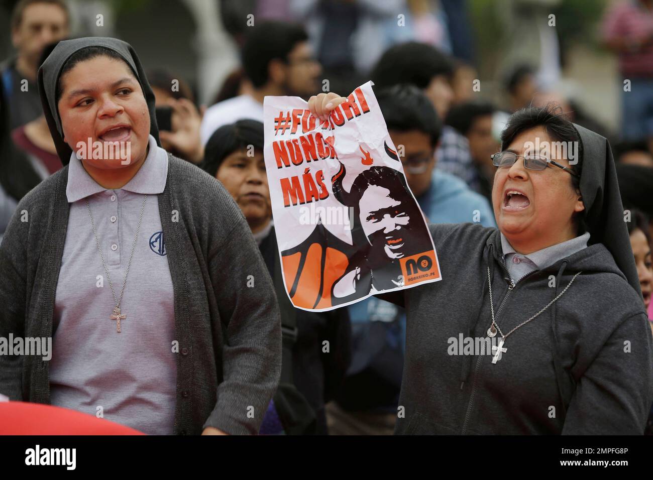 Nuns shouts slogans against Keiko Fujimori, daughter of jailed former
