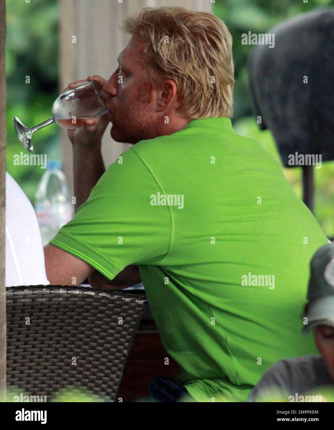 Former number one professional tennis player Boris Becker and his wife  Sharlely 'Lilly' Kerssenberg Becker enjoy a relaxing lunch at their luxury  hotel with friends and their baby son Amadeus Benedict Edley