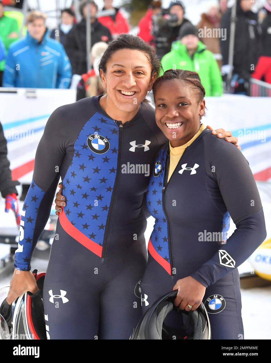 Second placed Elana Meyers Taylor, lrgy, and Kehri Jones of the United  States pose for media after the women's bobsled World Cup race in  Innsbruck, Saturday, Dec. 16, 2017. (AP Photo/Kerstin Joensson
