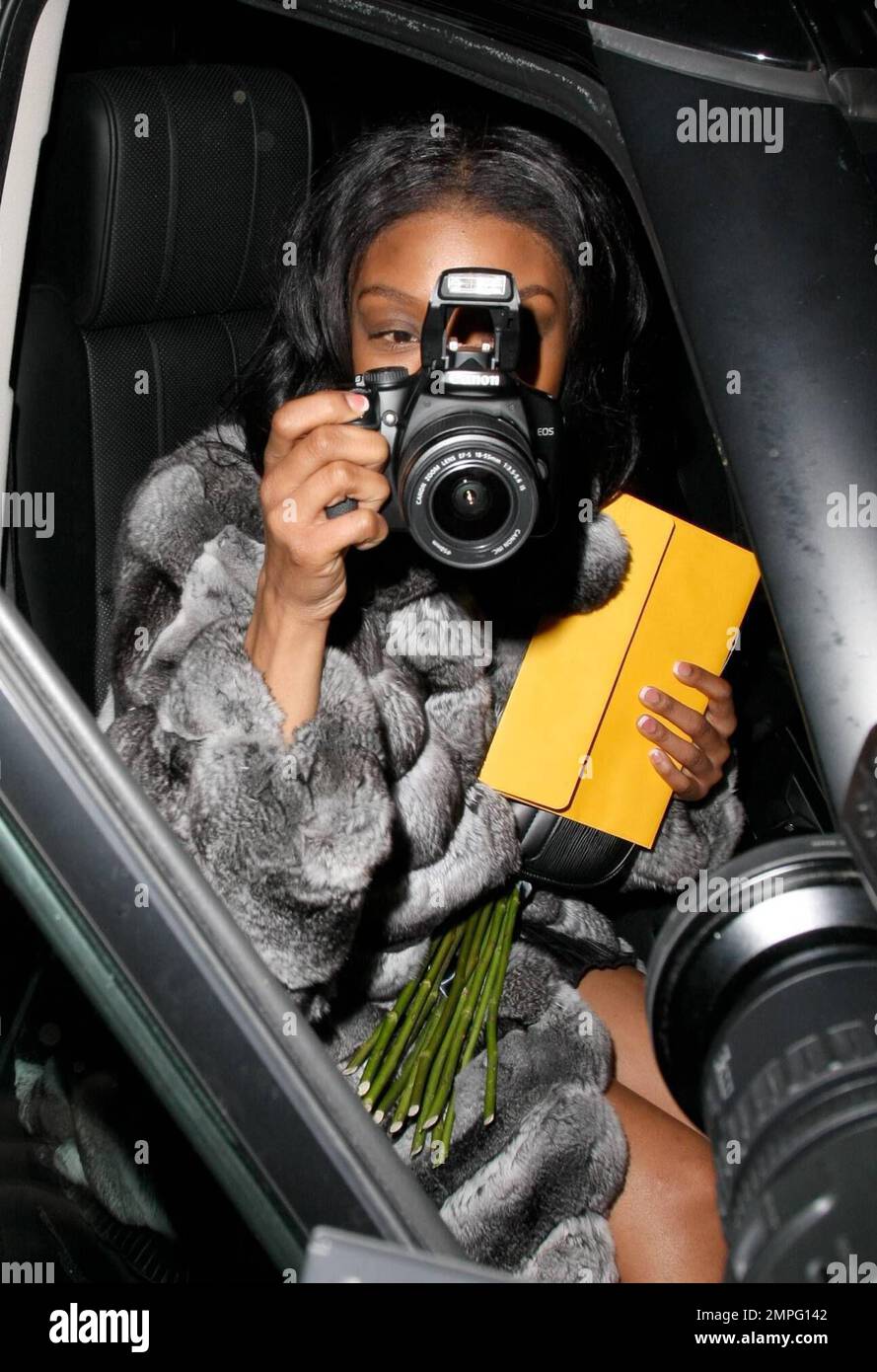 R&B singer and actress Brandy turns the tables on photographers as she