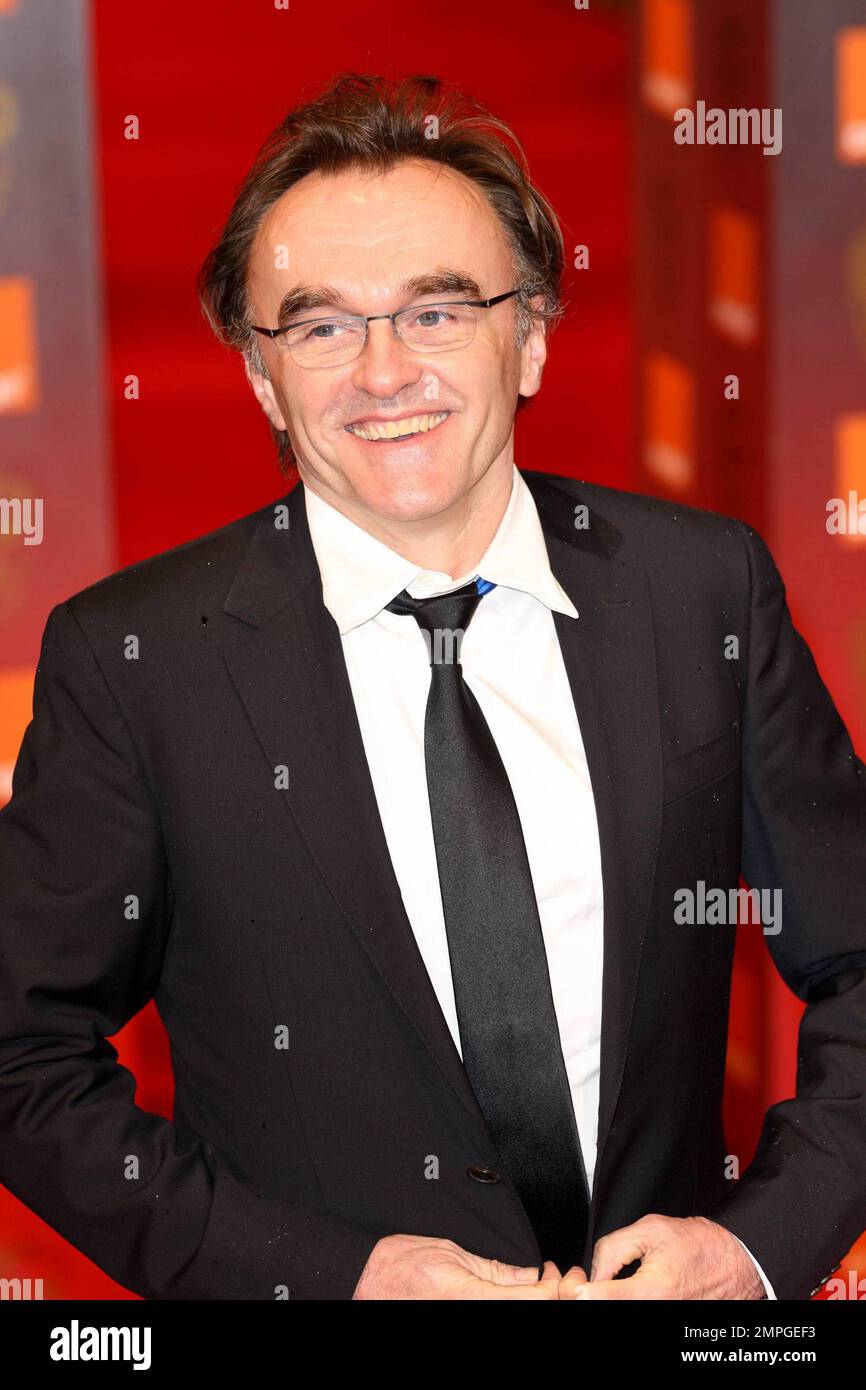 Danny Boyle poses for photographers on the red carpet at the 2011