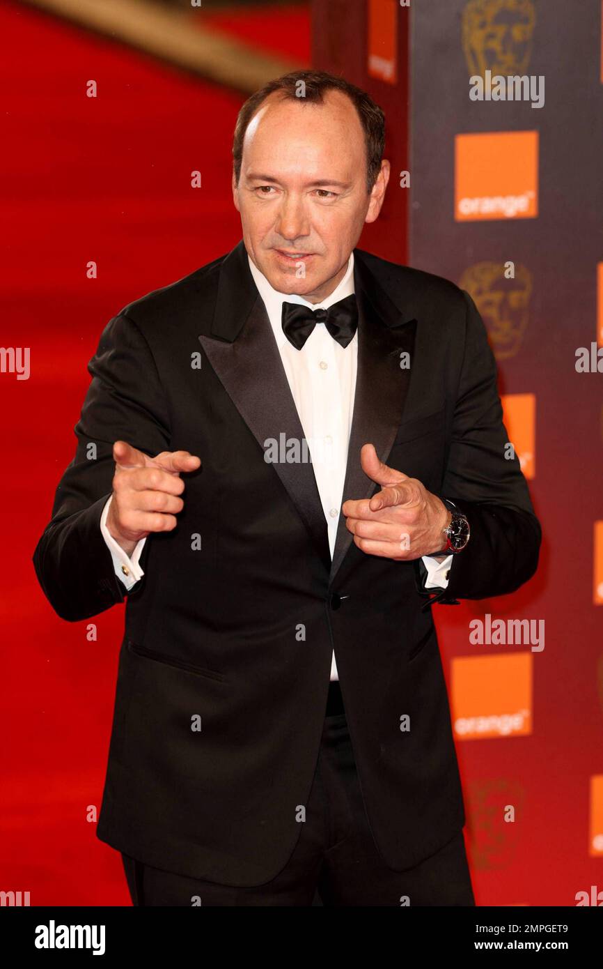 Kevin Spacey poses for photographers on the red carpet at the 2011ange(02)