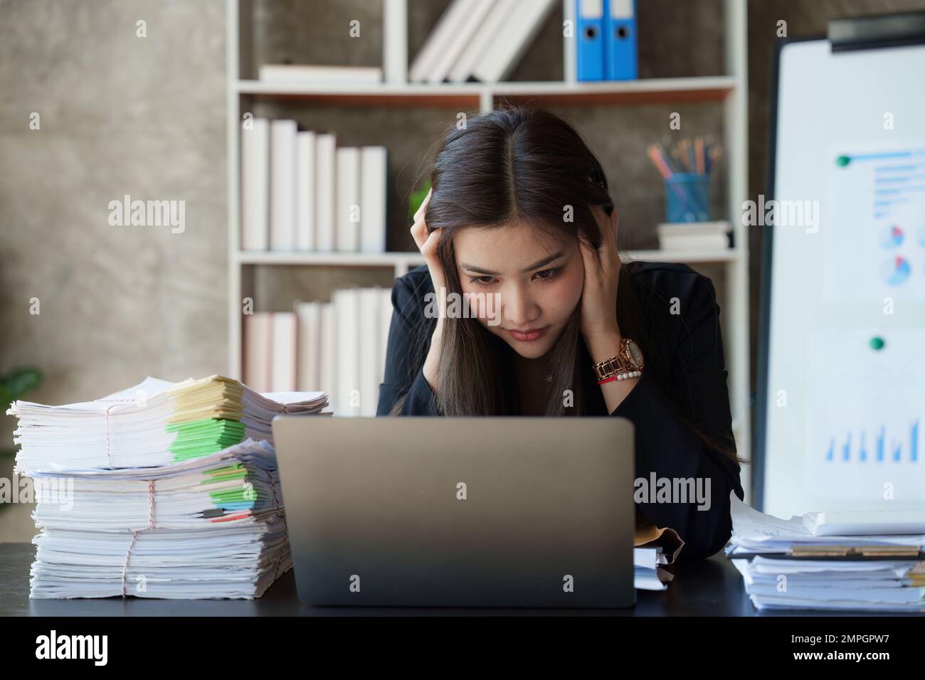 Stressed overwhelmed business person feels tired at corporate meeting Stressed overwhelmed business person feels tired at corporate meeting